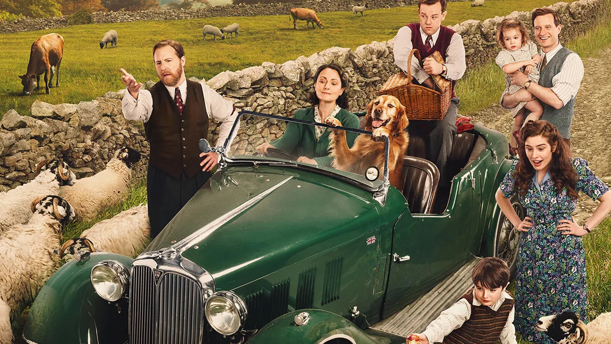 All Creatures Great and Small Series 6 poster with the cast posing around a green car in front of a cobbled wall