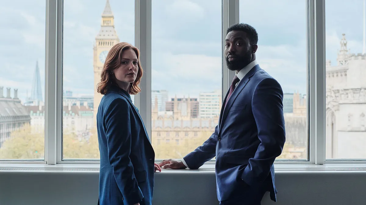 L-R: Rachel Carey (Holliday Grainger) and Isaac Turner (Paapa Essiedu)