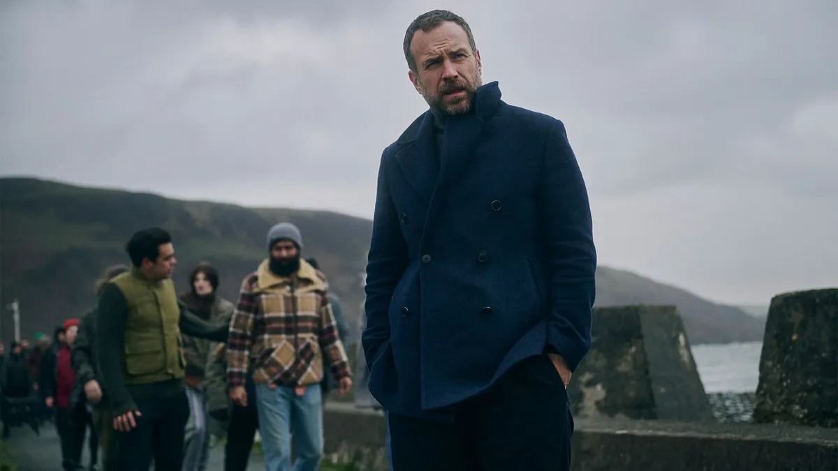 Rafe Spall as Eric Bull